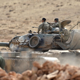 Tanks and soldiers of Turkish military waiting at Turkey - Syria border near Sanliurfa, 27 October 2014