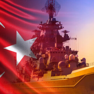 Warship on the background of the Turkish flag