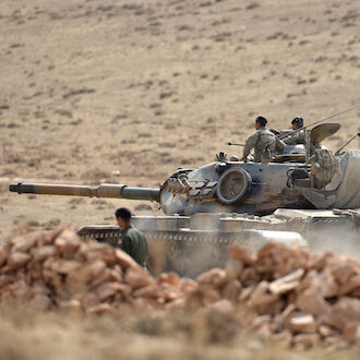 Tanks and soldiers of Turkish military waiting at Turkey - Syria border near Sanliurfa, 27 October 2014