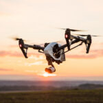 quadrocopter drone at sunset