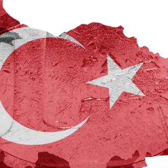 Turkish flag overlayed on the country map and Euro coin background