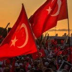 Crowds gathered with Turkish flags unfurled at sunset in İstanbul, Turkey on 07.15.2017 for a military coup and protest meeting