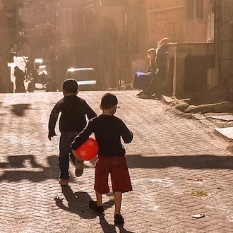 Turkish children playing in the streets of a poor Istanbul neighborhood